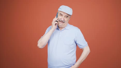 Happy-talking-old-man-on-the-phone.